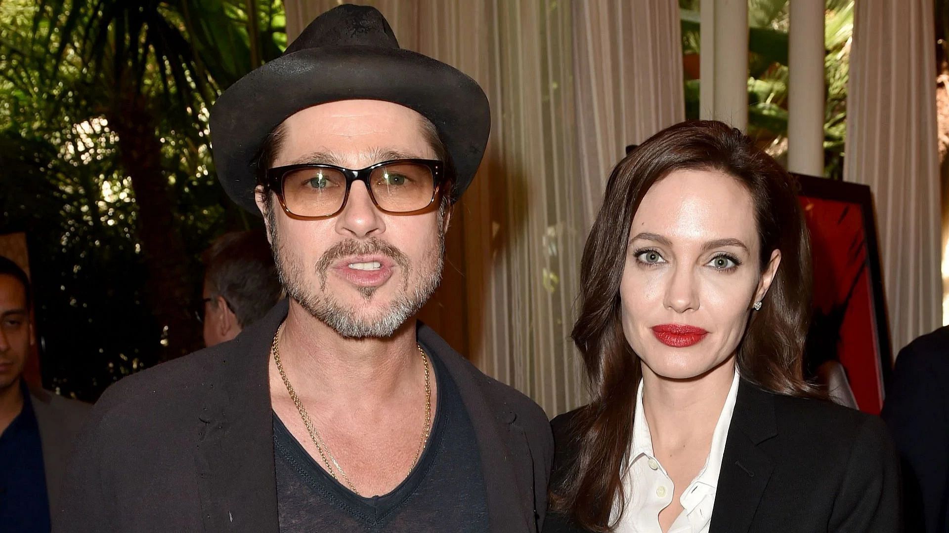 Brad Pitt (L) and Angelina Jolie attend the 15th Annual AFI Awards at Four Seasons Hotel Los Angeles (Image via Getty)